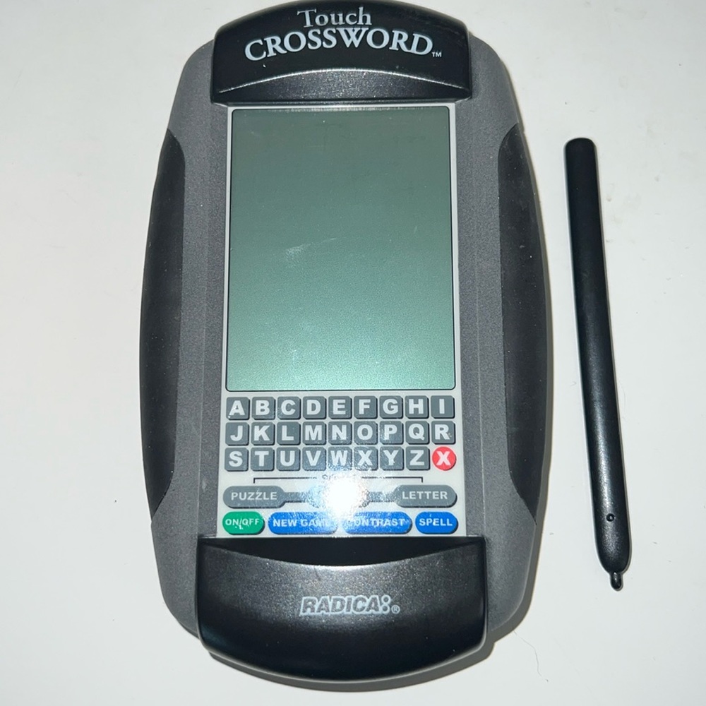 Radica Handheld Touch Crossword Game